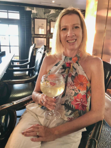 The author Elise Kirsten, enjoying a gin cocktail at the Leopard Bar