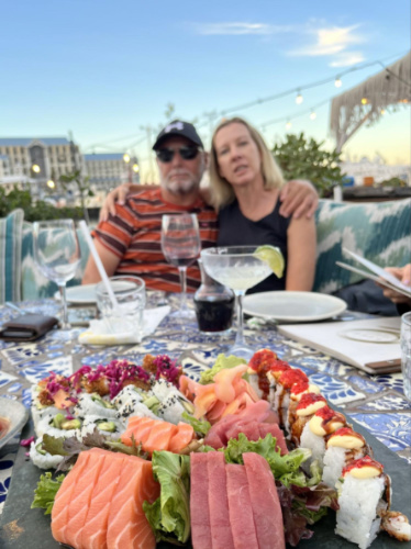 The author Elise Kirsten and her husband, enjoying the sushi and drinks at Life Grand Café