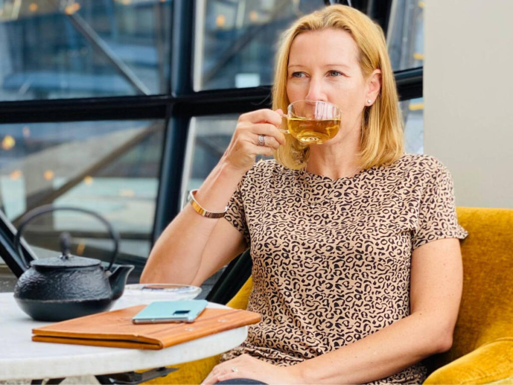 The author Elise Kirsten, enjoying her drink at the Granary Café