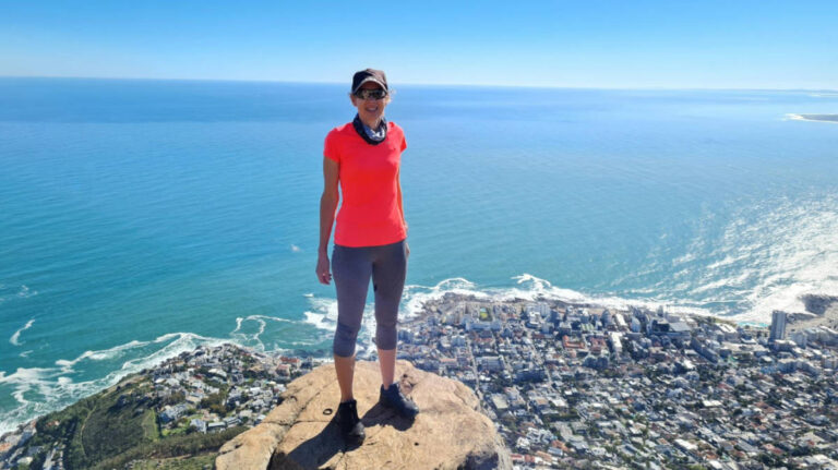 The author Elise Kirsten, standing on top of the Lion’s Head