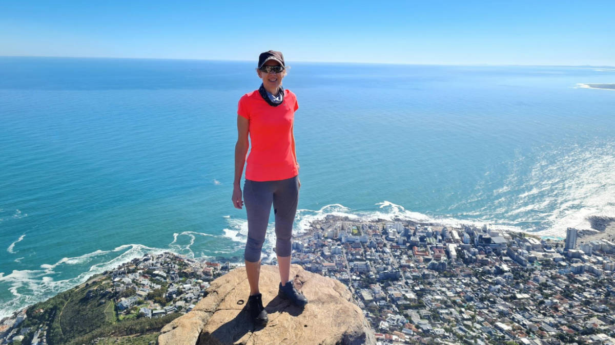 The author Elise Kirsten, standing on top of the Lion’s Head