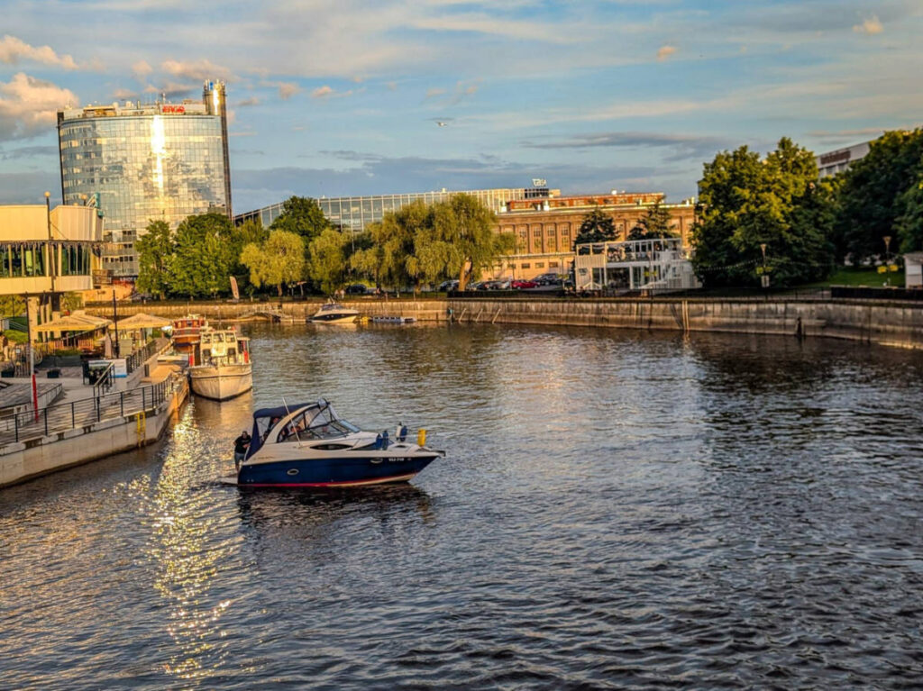 A boat sailing on the Emajõgi river at sunset