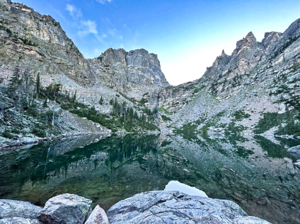 Picturesque view of the Rocky Mountain National Park reflecting on the Emerald Lake