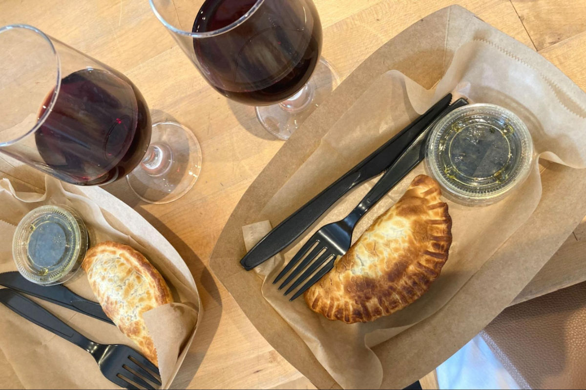 Empanadas and two glasses of Malbec wine in Lazo Empanadas
