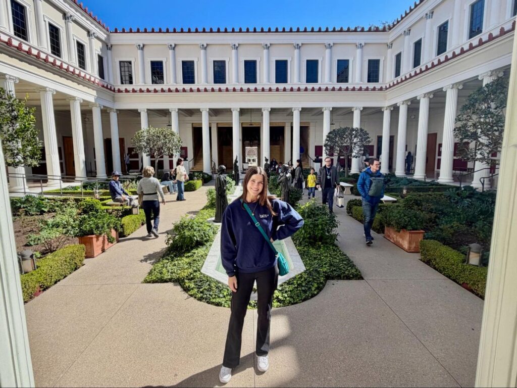 Author Betty in the entrance courtyard at the Getty Villa