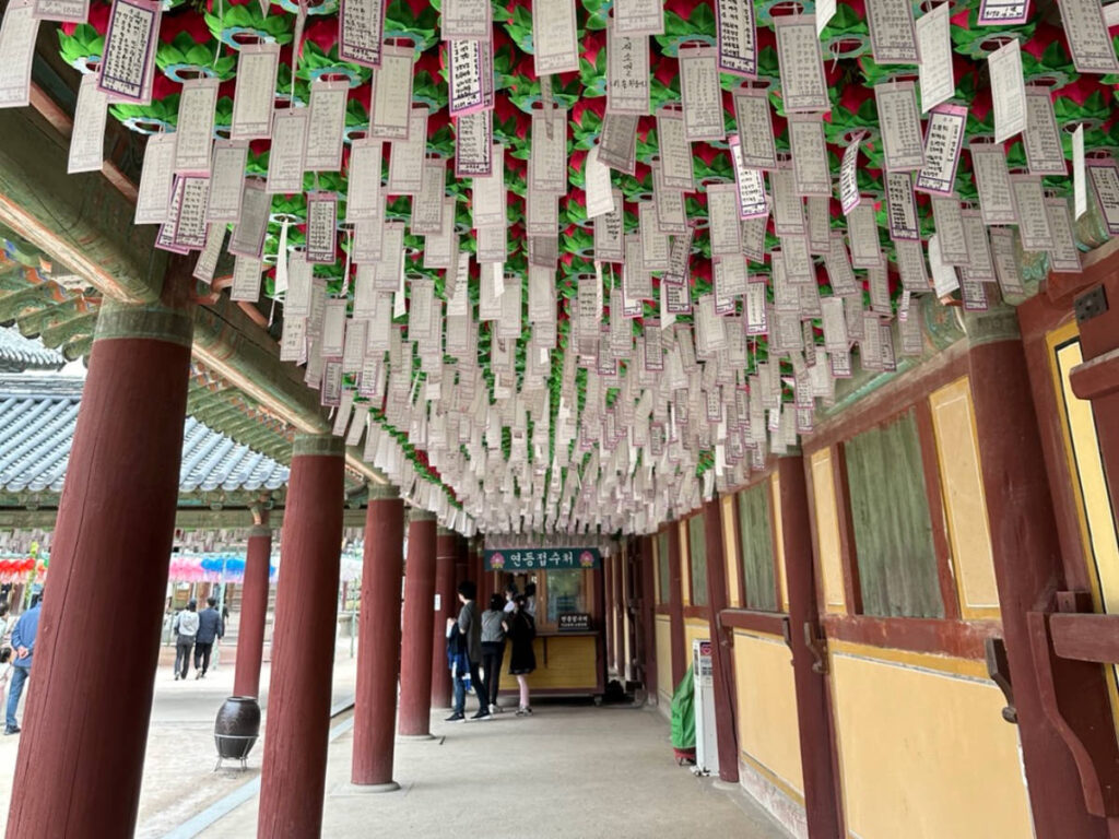 View of the wish papers and lanterns on ceiling at the entrance to Bongeunsa Temple