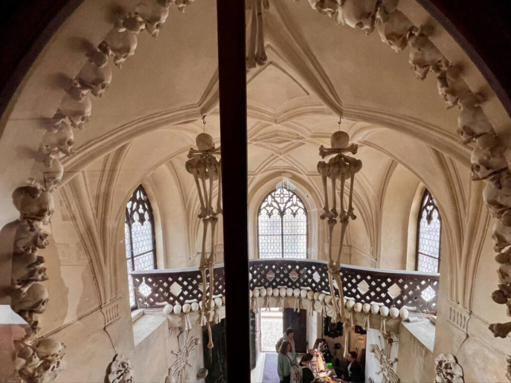 View of the hanging skeletons at the entrance to Sedlec Ossuary