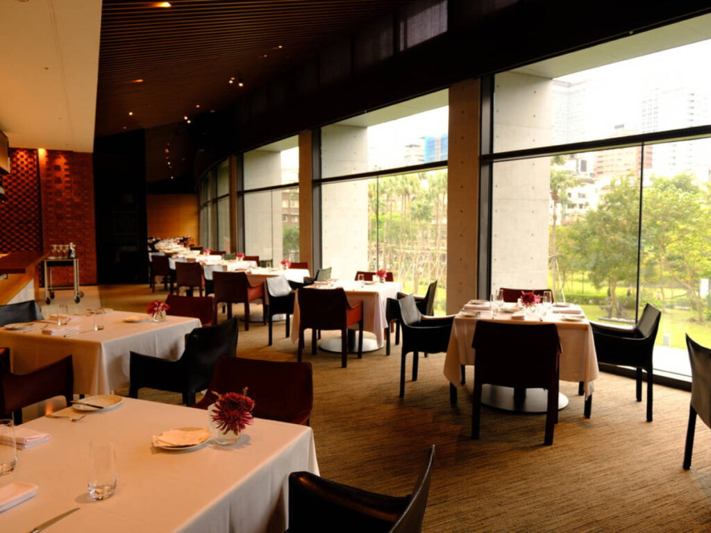 The dining tables by the huge windows