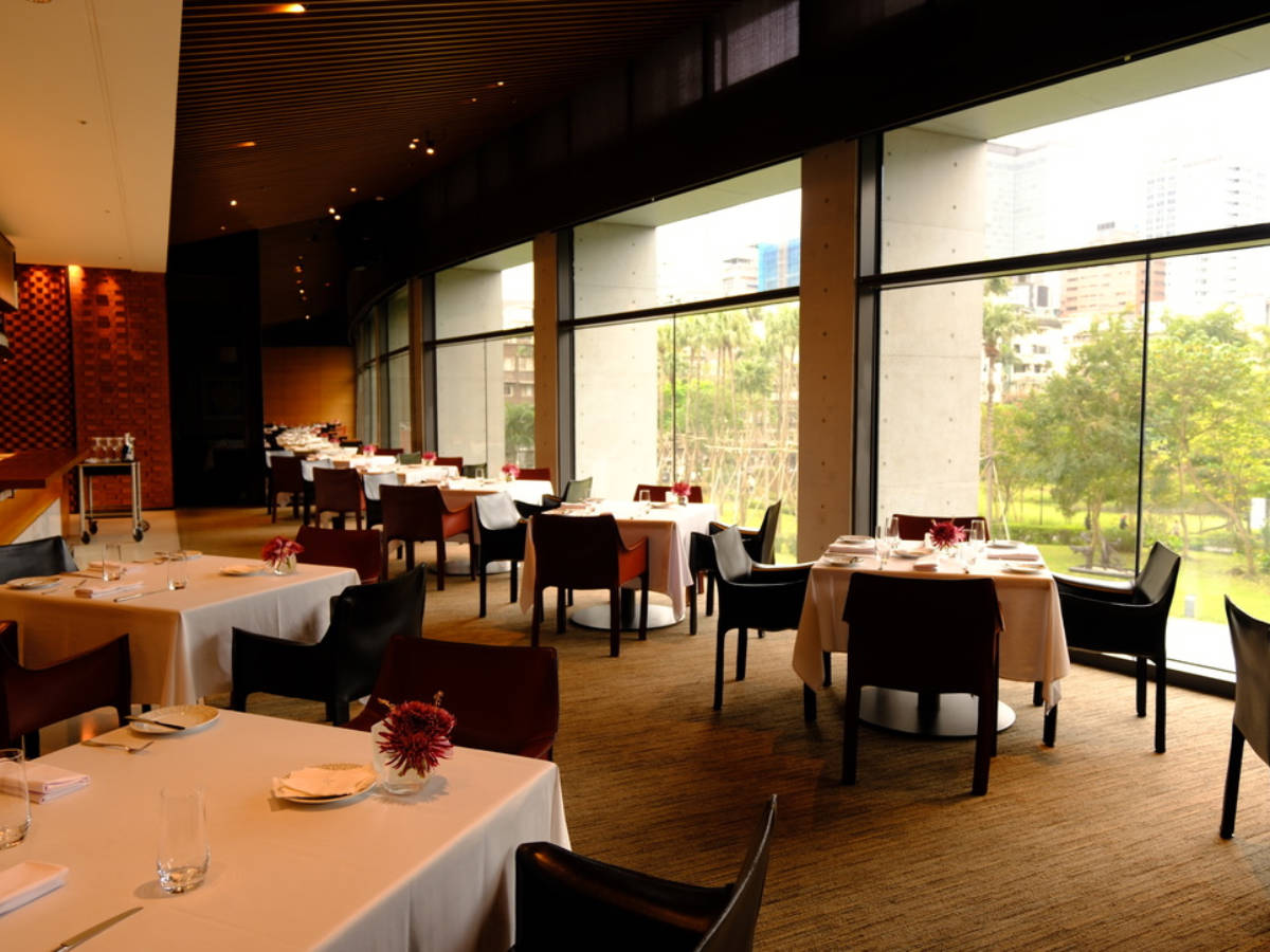 The dining tables by the huge windows
