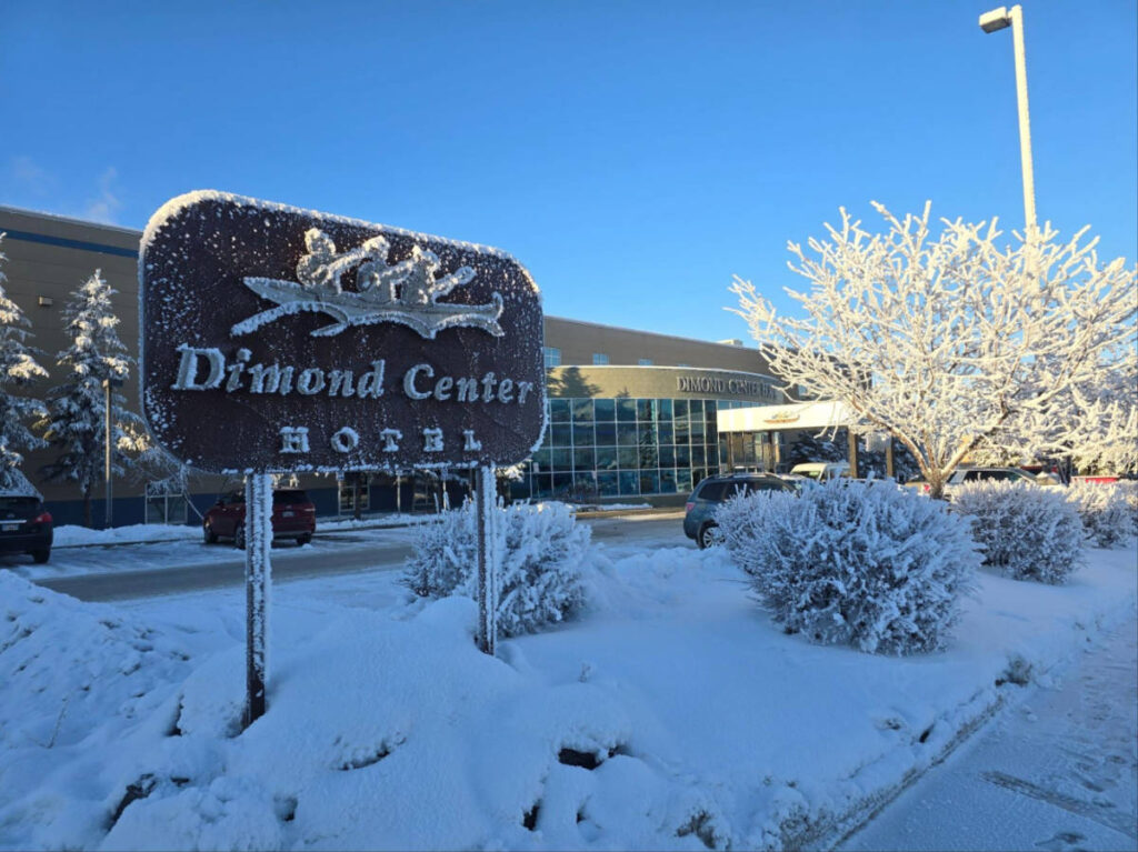 View of the landmark signage outside the Dimond Center Hotel in winter