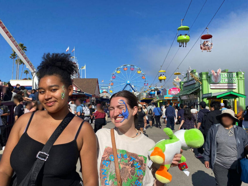 The author, Laura McFarland with her friend with paint on their faces at the Boardwalk