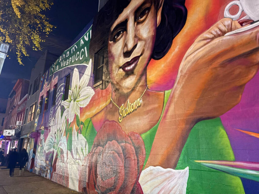 Closeup look of the colorful Famiglia Mural on Graham Ave