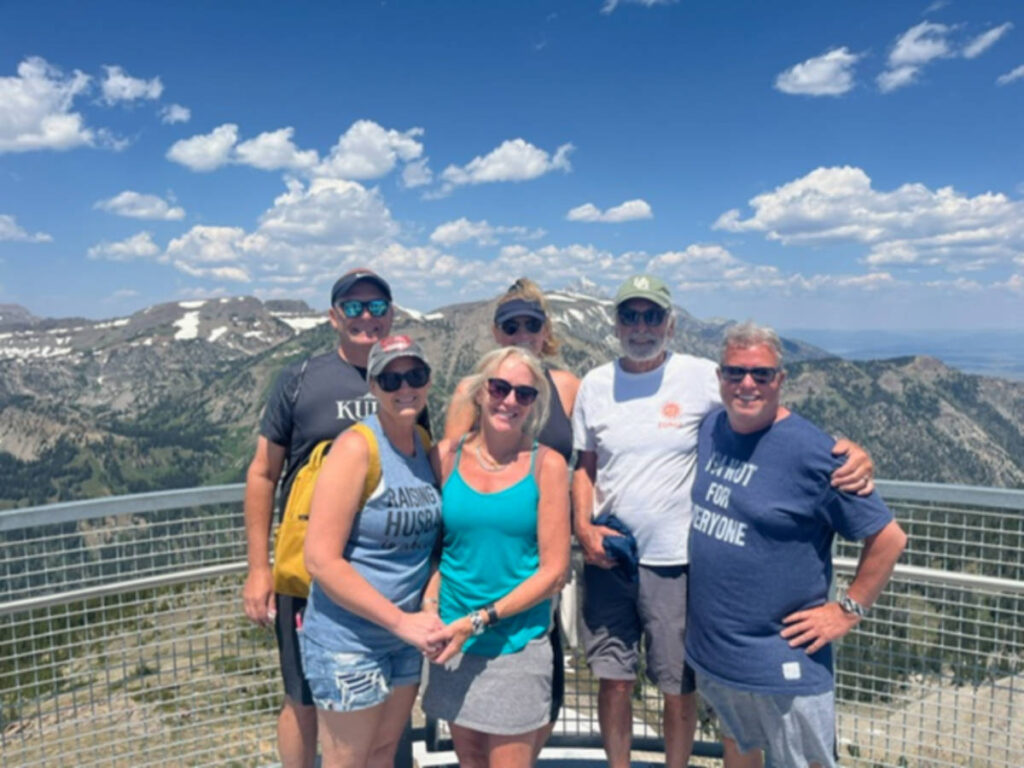 The author Morri Stewart with her family and friends at the Top of the World