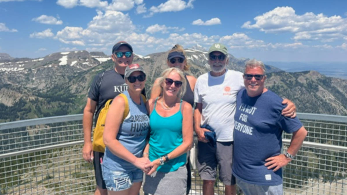 The author Morri Stewart with her family and friends at the Top of the World