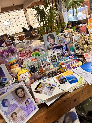 A collection of fan gifts for BTS Jimin at ZM-illenial Cafe