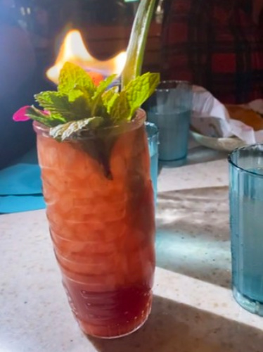 A flaming tropical beverage at the Toasted Coconut