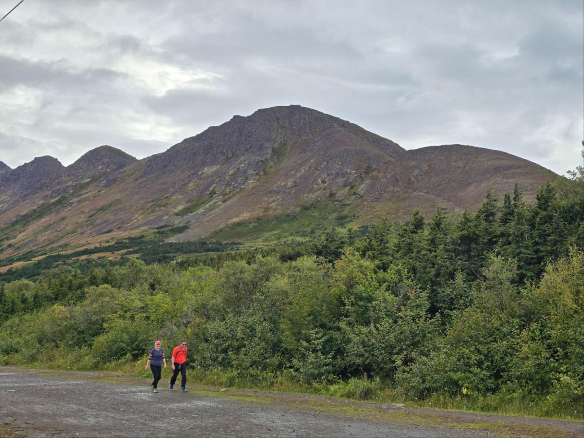 Hikers walking on the Flattop Mountain Trail