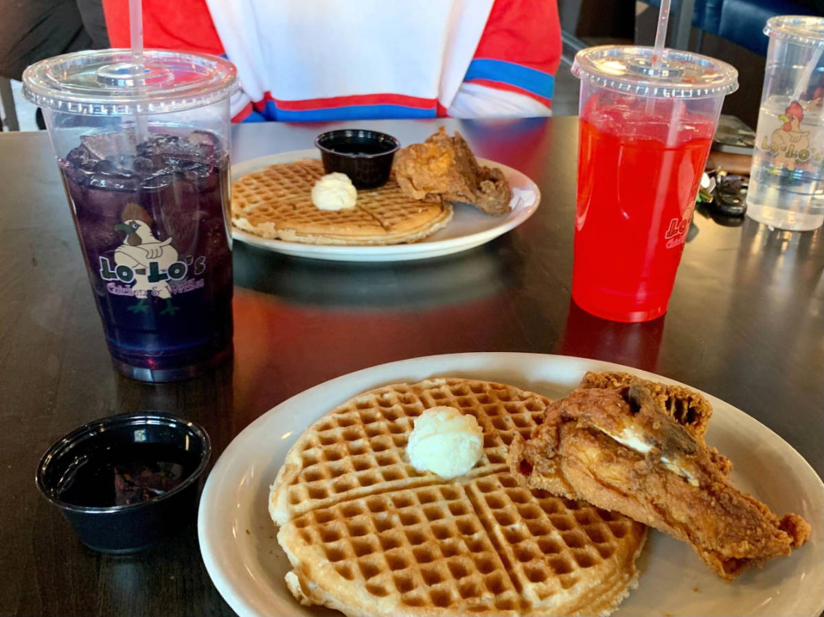 View of waffles and drinks served at the Lolo’s Chicken & Waffles