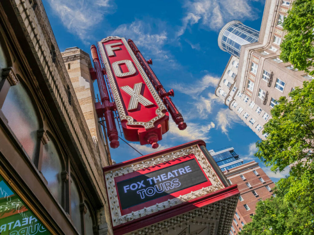 View of the Fox Theatre sign on Peachtree Street seen from below