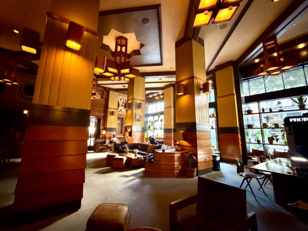 View of the lodge-like interior of the lobby and bar of Freehand Hotel