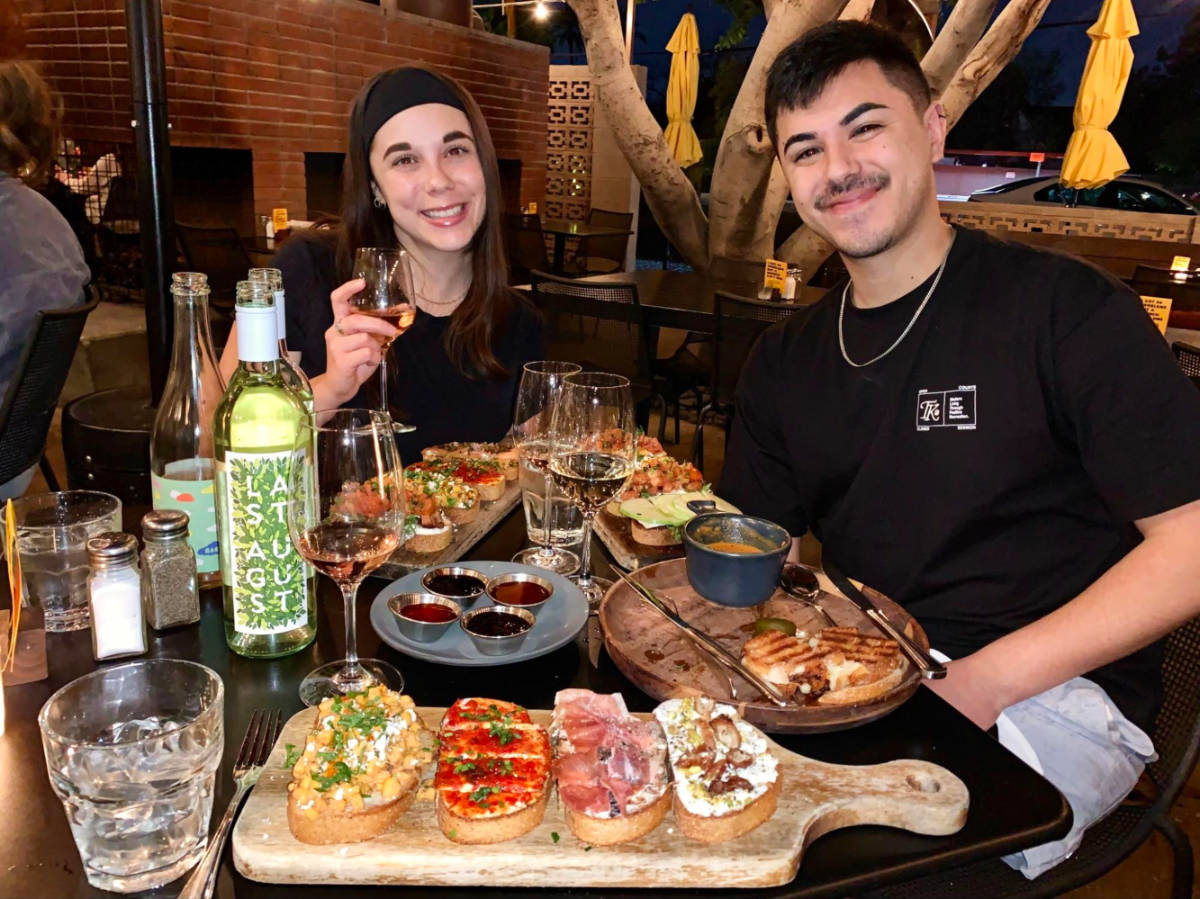 The author's friends drinking and dining at Postino