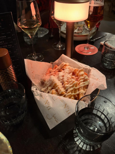 The fries topped with cheese from 