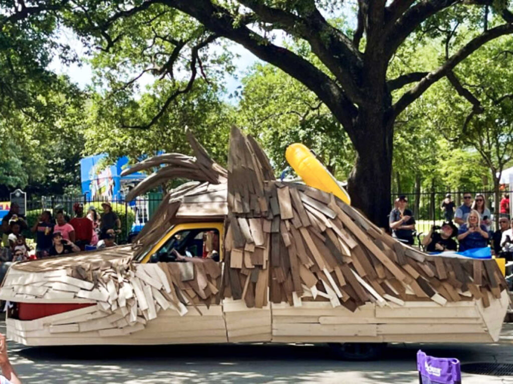 A decorated car at the Art Car Parade