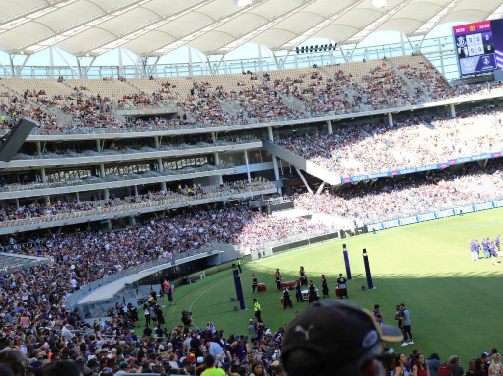 Crowd watching a game in the Optus Stadium