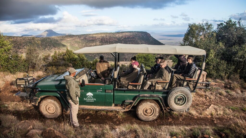Tourists sitting patiently on the car for the Game drives