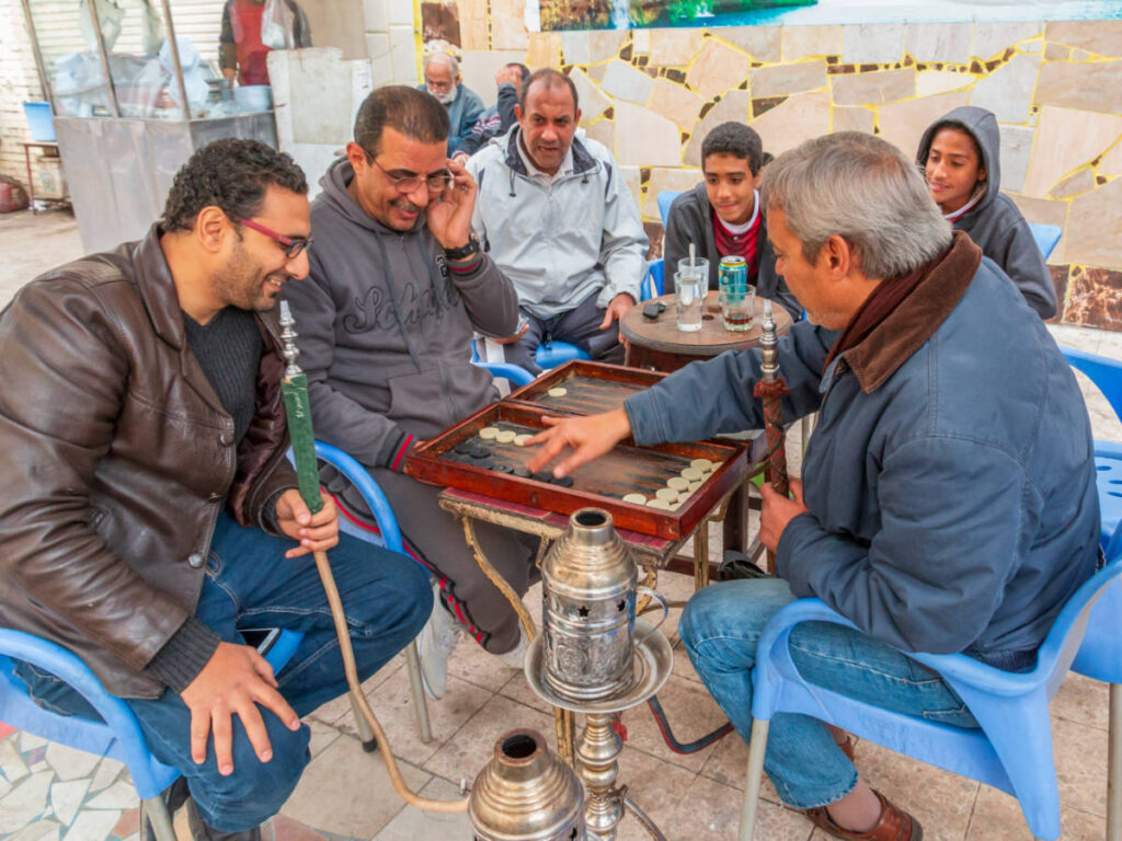 A group of men playing Tawla