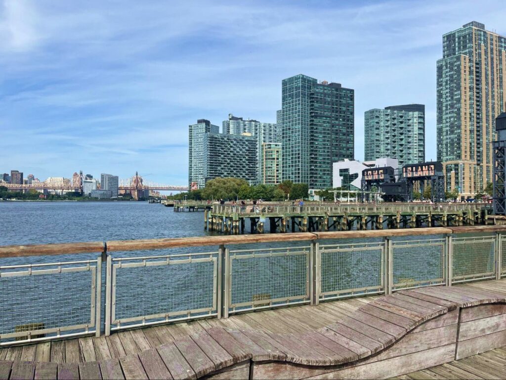 View of the buildings and the waters from Gantry Plaza State Park boardwalk