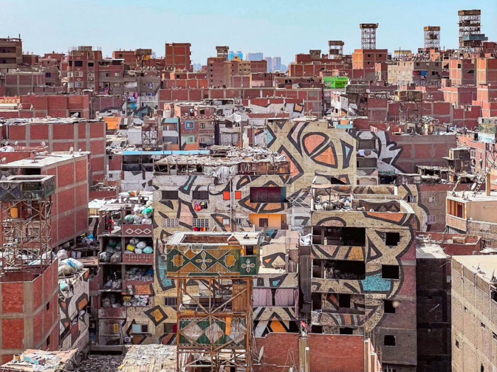 Street art and crowded buildings at the Garbage City