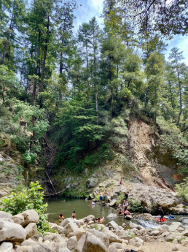 People enjoying their day at the Garden of Eden swimming hole