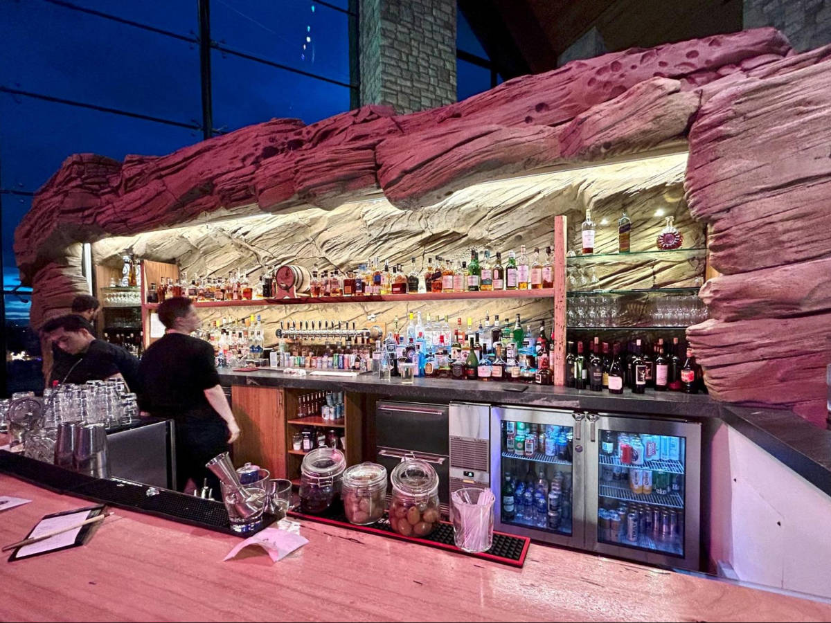 View of the intricate lobby bar in Gaylord Rockies Resort