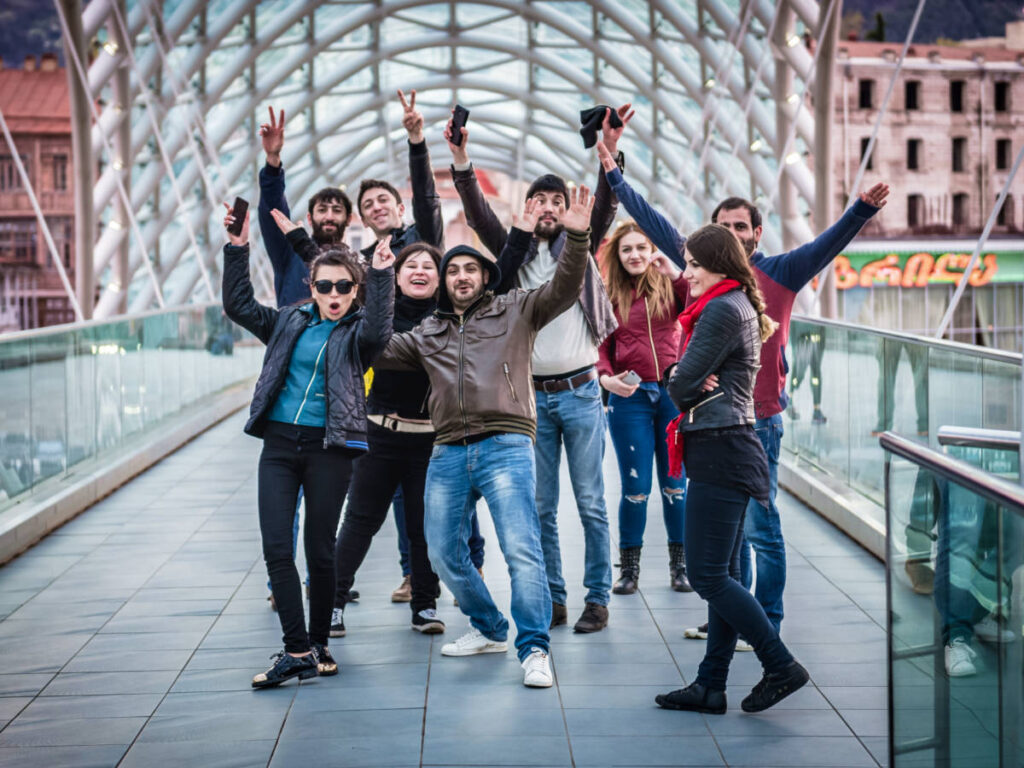 A group of Georgian friends smiling for a photo