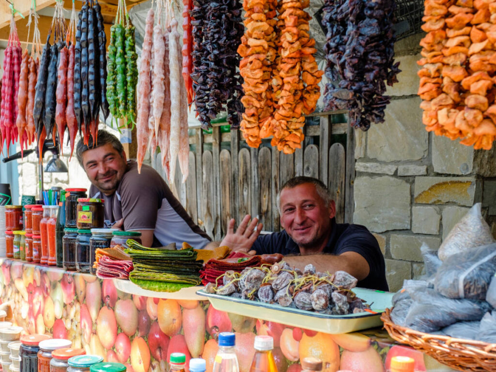 Georgian vendors smiling for a photo