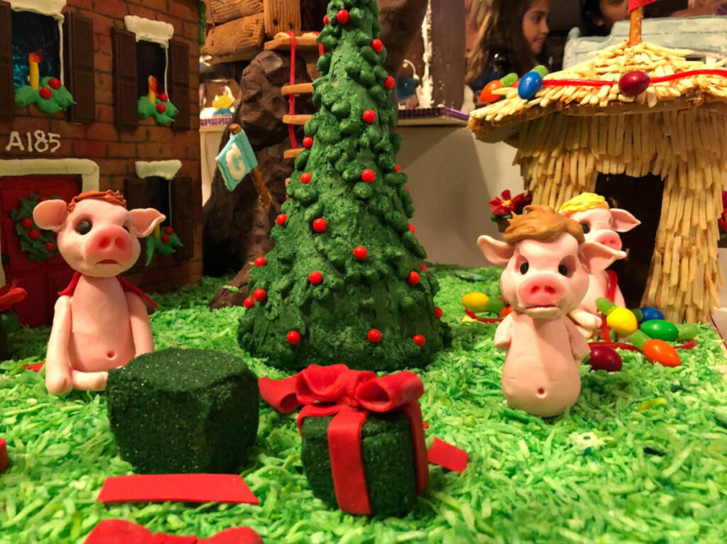 Closeup look of the gingerbread house and the holiday displays candies