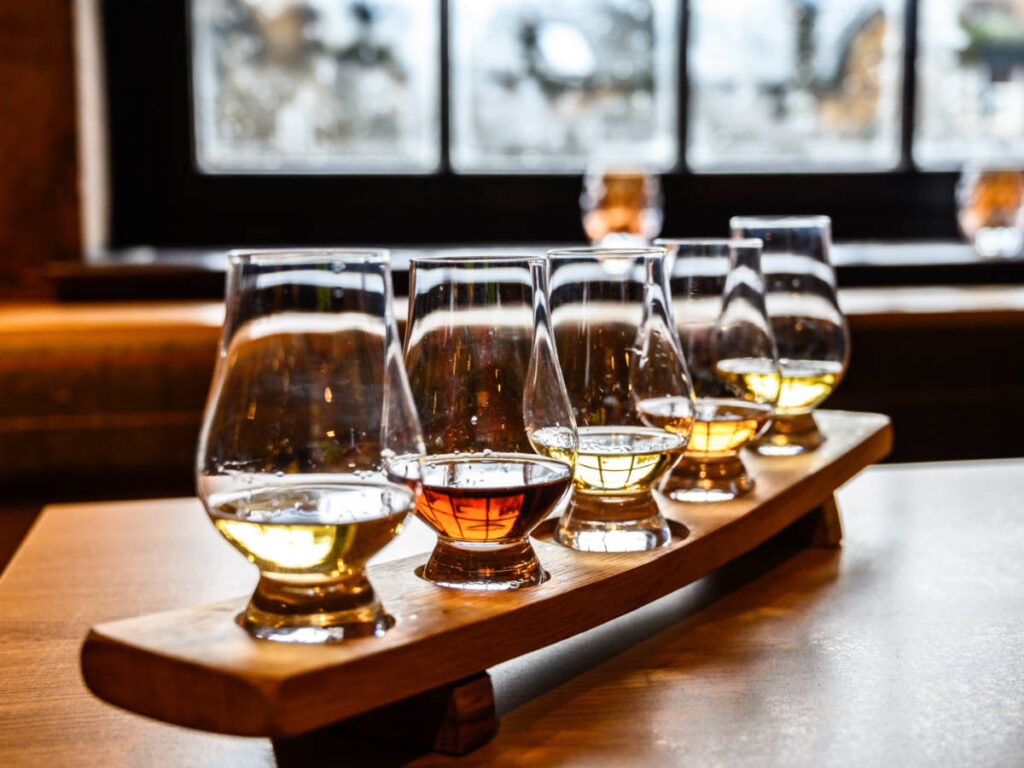 A flight of whisky on the table