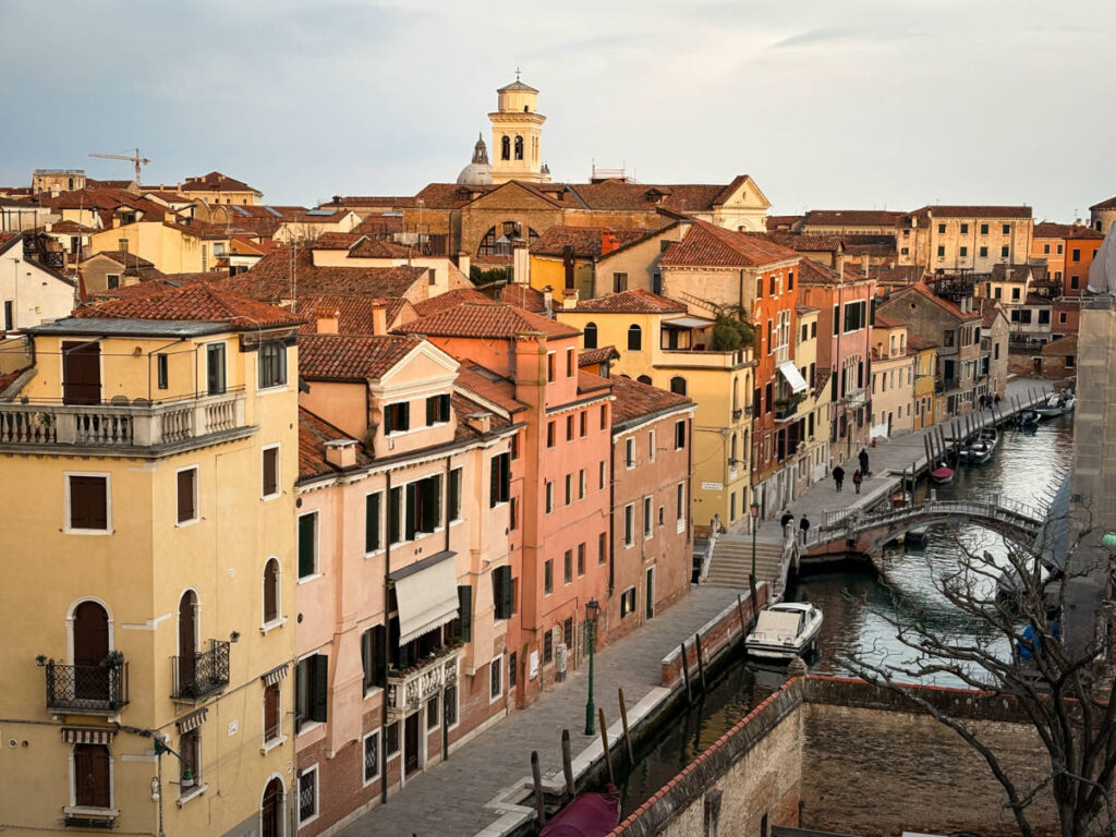 Overlooking view of the golden hues reflecting on the buildings in Dorsoduro at sunset