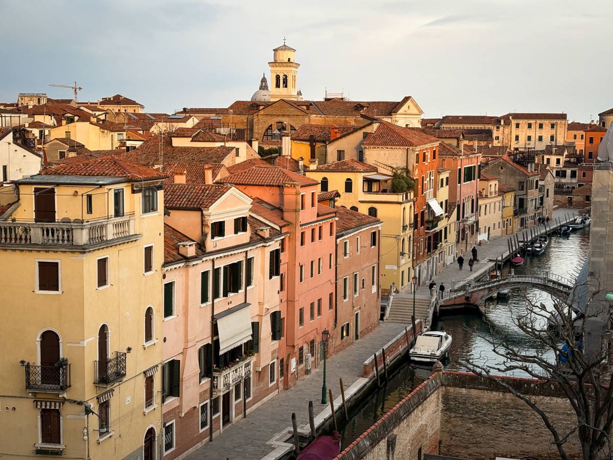 Overlooking view of the golden hues reflecting on the buildings in Dorsoduro at sunset