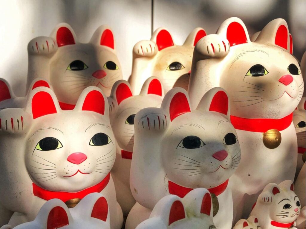 A bunch of Maneki-neko figurines at Gotokuji Temple