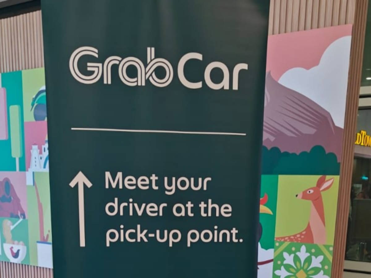The signage of Grab Car