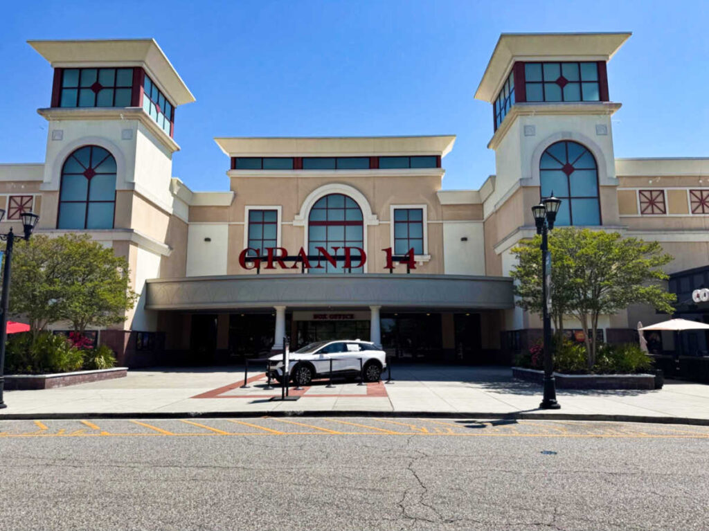 Exterior and entrance view of the Grand 14 Theatre