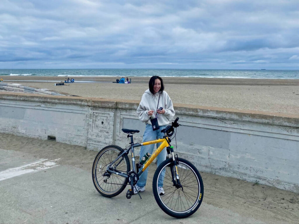 The author's friend with her bike in Great Ocean Highway
