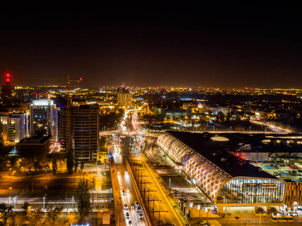 Aerial view of the city skyline illuminated at night
