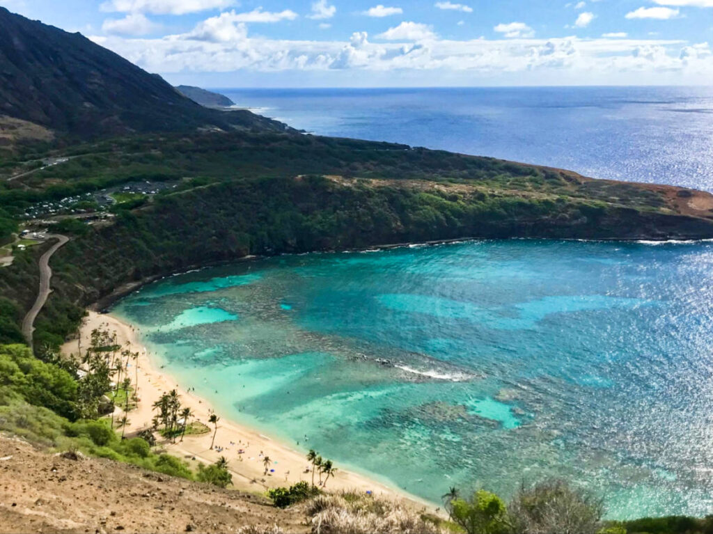 Aerial view of the scenic turquoise water and the greenery around Hanauma Bay