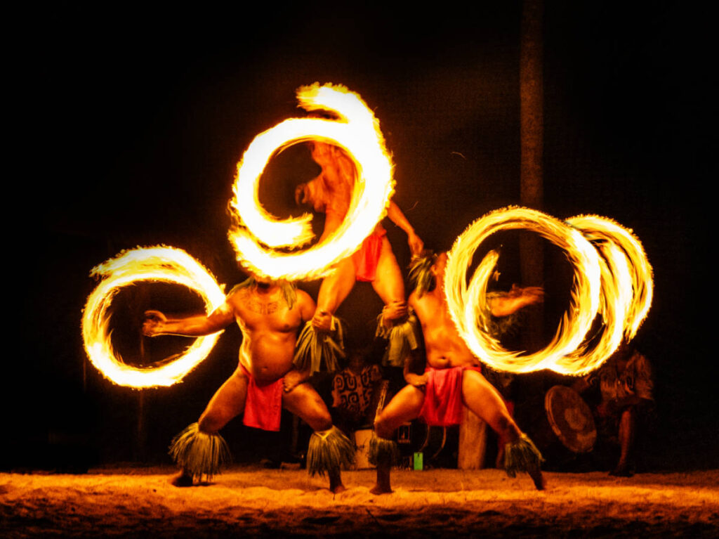 A motion blur of the Hawaiian Fire Dancers performance
