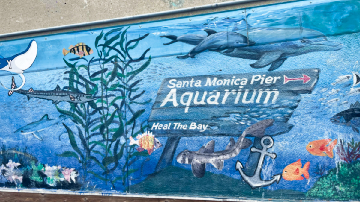 View of the signage of "Santa Monica Pier Aquarium Heal the Bay"