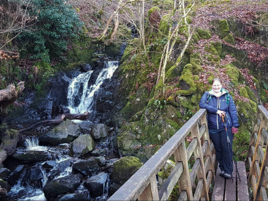 The author Heather Cole, hiking in the mountain