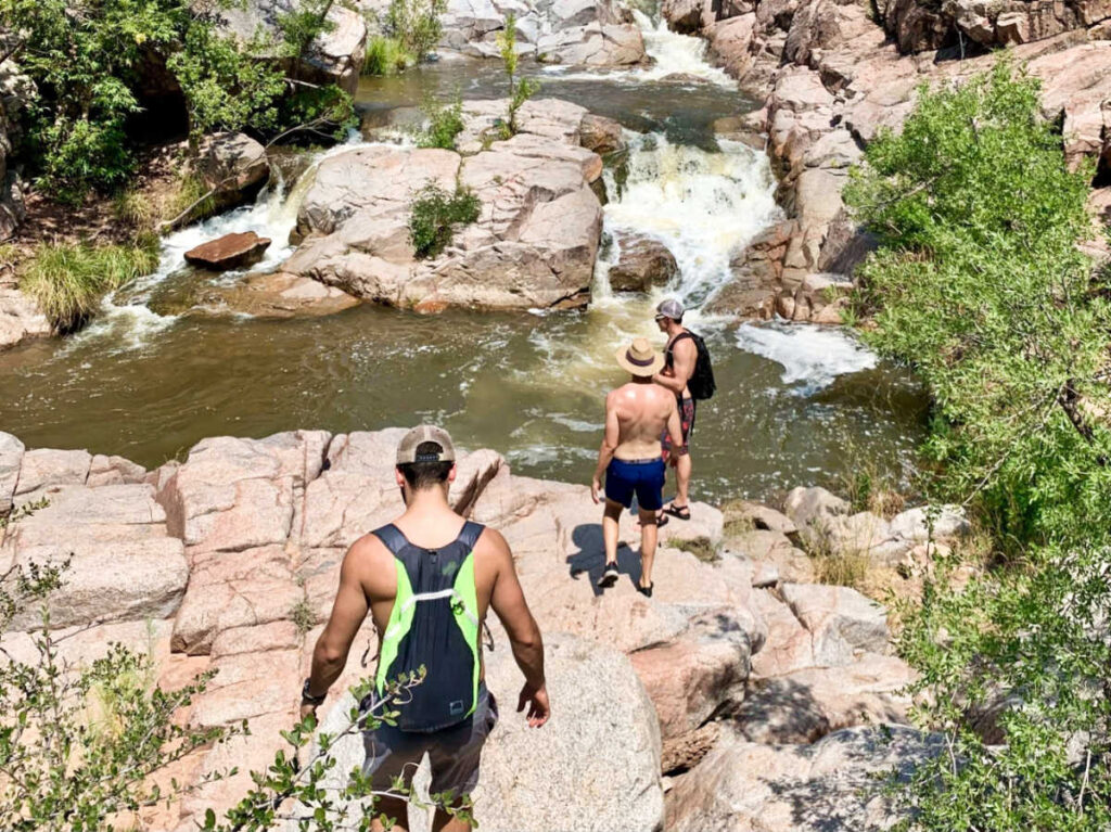 Mean walking down the pool at Waterwheel Falls